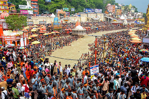 Kanwariyas collect Ganga river water at Haridwar